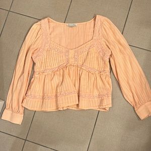 Salmon pink flare top. Long sleeve